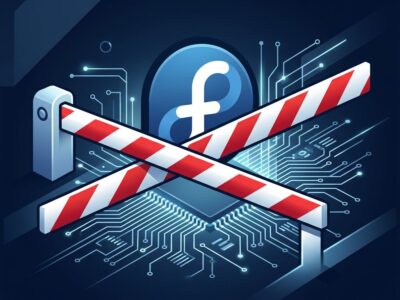 Fedora logo with blocked stamp overlay on a dark blue tech background representing the blocked AI developer desktop initiative