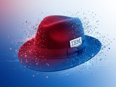 Red Hat fedora logo dissolving into IBM blue branding, symbolizing the brand dissolution on October 1 2026
